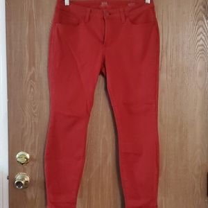 Rust color skinny jeans